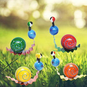 Cruis Cuka snail ornament displayed on flat surface for shelf display