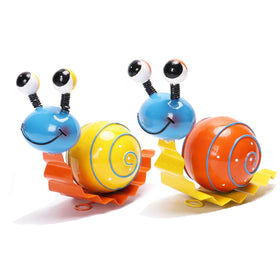 Cruis Cuka snail garden decor yellow enhances outdoor curb appeal.