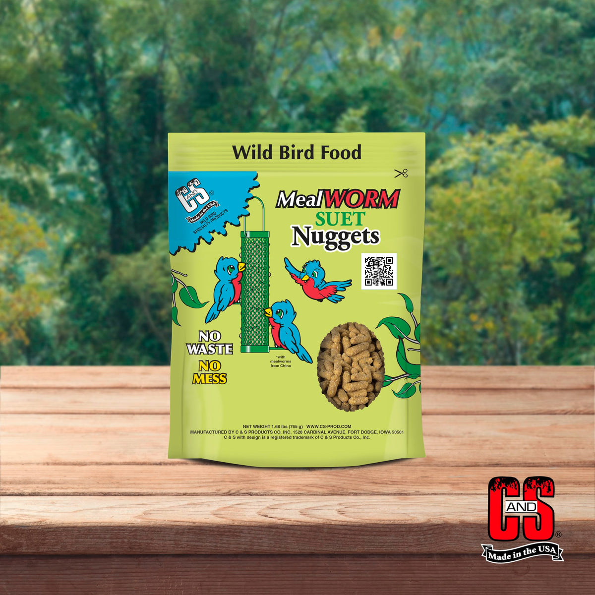 Birds flocking to C&S suet nuggets in a traditional feeder.