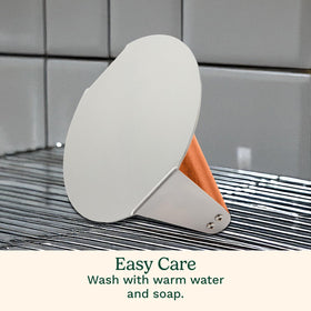 Cuisinart burger press easy to clean by hand after cooking