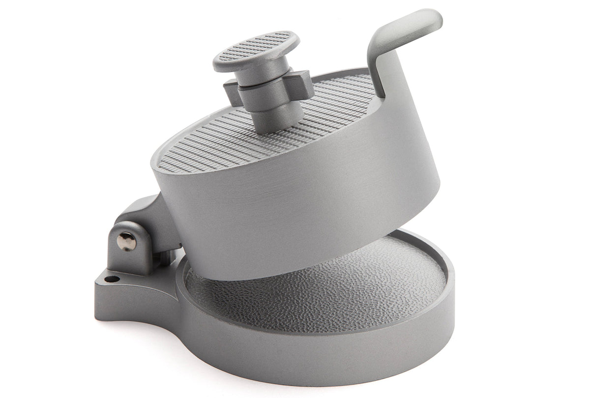Cuisinart burger press shows easy cleanup on nonstick cast aluminum surface.