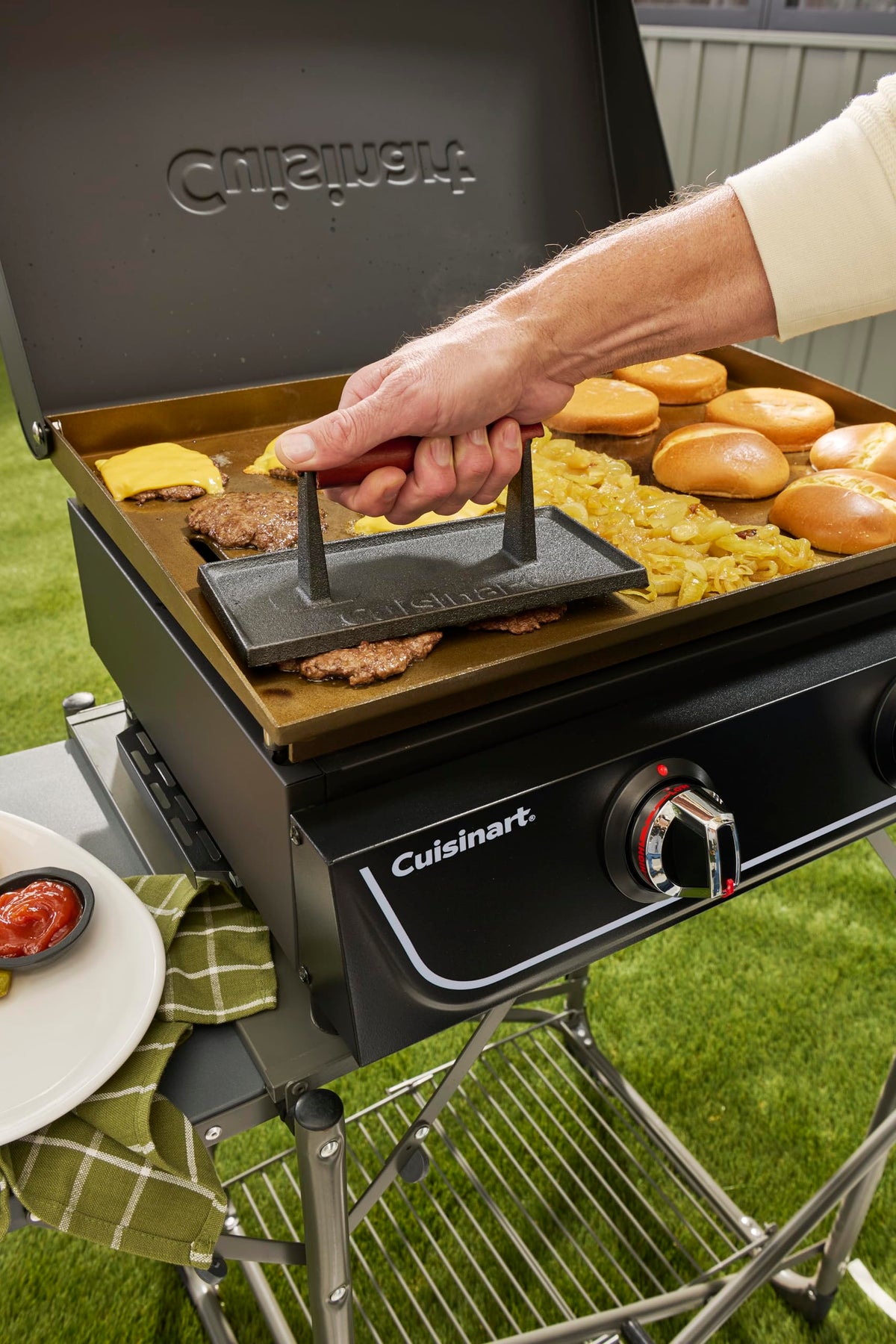 Cuisinart cast iron press used on sandwiches for even crust.