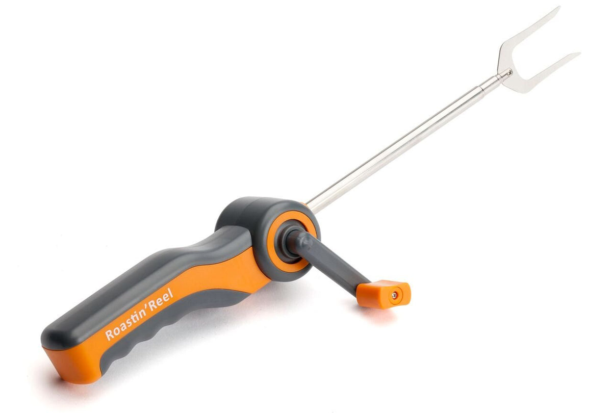 Cuisinart S'More To Love Roasting Reel over campfire to easily roast marshmallows