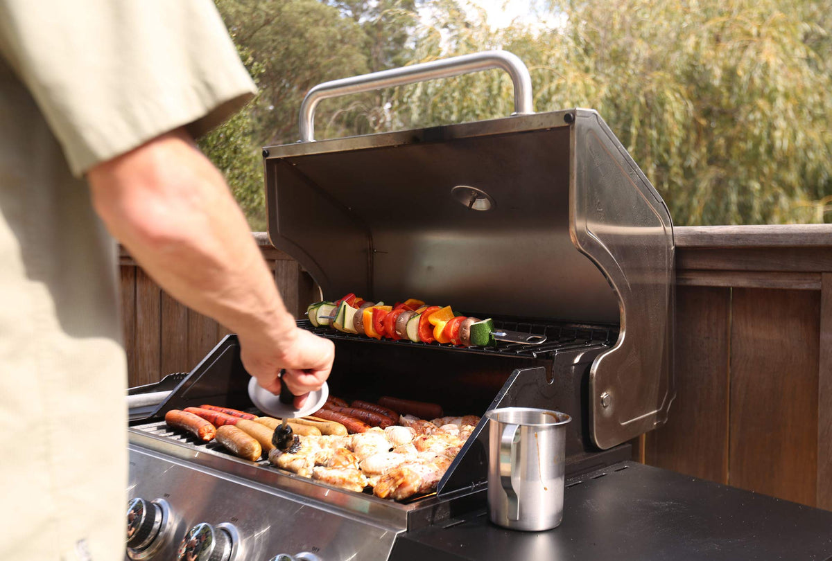 Cuisinart stainless-steel sauce pot endures high heat for BBQ sessions.