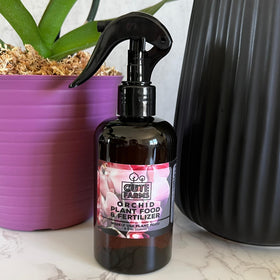 Cute Farms 8oz bottle label, ready for weekly orchid care.