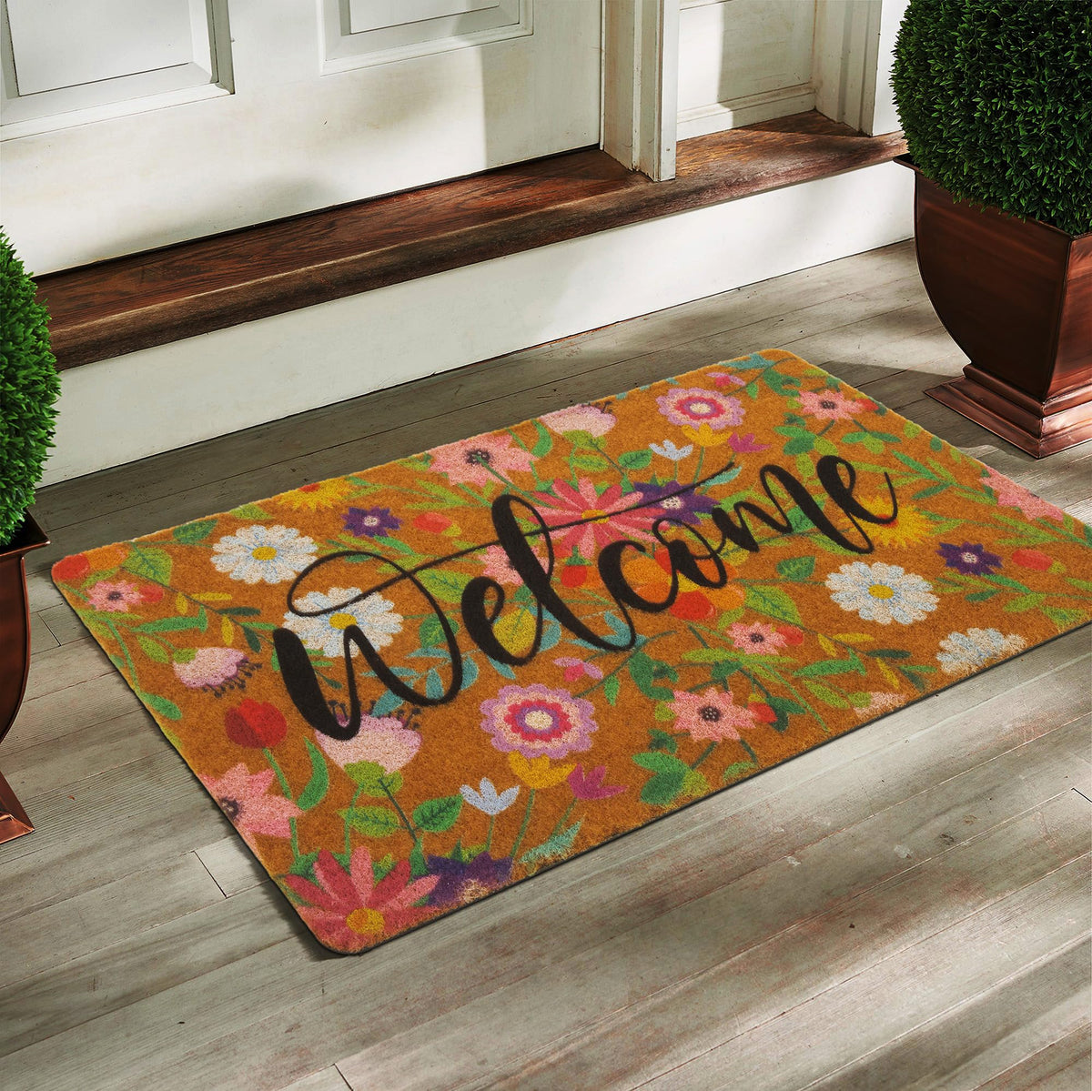 CXQRR flower-pattern door mat adds color to the entryway.
