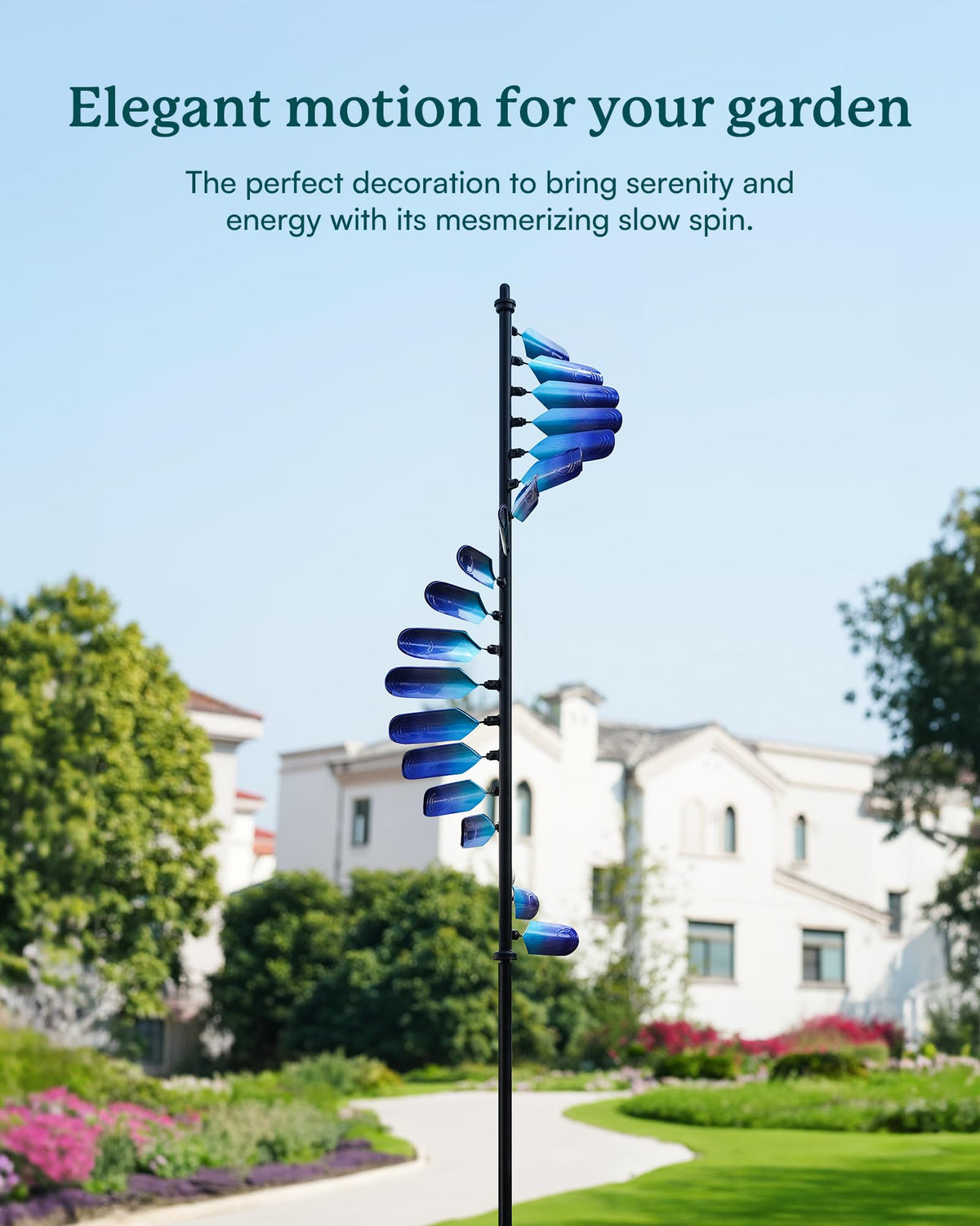 Cyan Oasis wind spinner adjustable height showcases the peacock spiral for prominent yard decor
