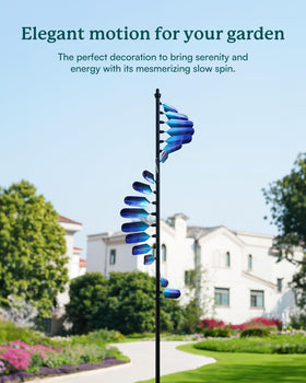 Cyan Oasis wind spinner adjustable height showcases the peacock spiral for prominent yard decor