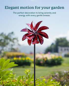 Cyan Oasis red windmill spinner captures breeze for lively motion.