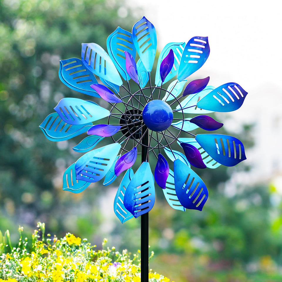Cyan Oasis Wind Spinner on yard stake adds kinetic color to your garden.