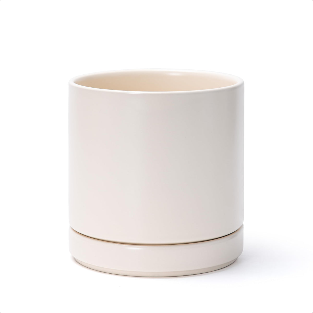 D'vine Dev 6.5-inch ceramic planter pot with drainage hole for healthy plants.