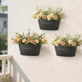 Dahey rectangular-design hanging planter used as a rustic tabletop centerpiece.