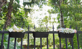 Dahey decorative balcony garden on rail enhances small spaces and herbs.