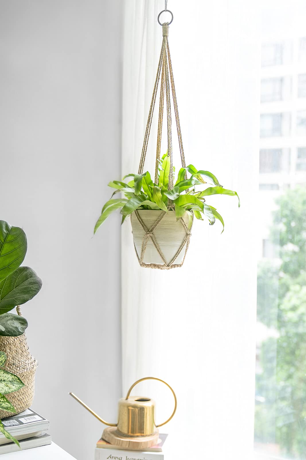 Dahey macrame 23-inch hanger fits various pot shapes.