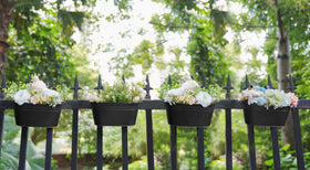 Dahey planter close-up shows drainage holes for water management