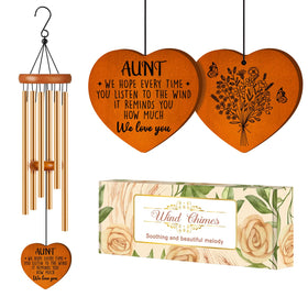 Damaigiift Aunt Wind Chime on garden wall creates soothing outdoor ambiance