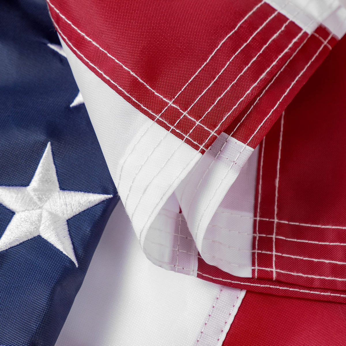 DANF FLAG brass grommets ensure secure pole mounting outdoors.