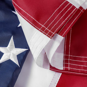 DANF FLAG brass grommets ensure secure pole mounting outdoors.