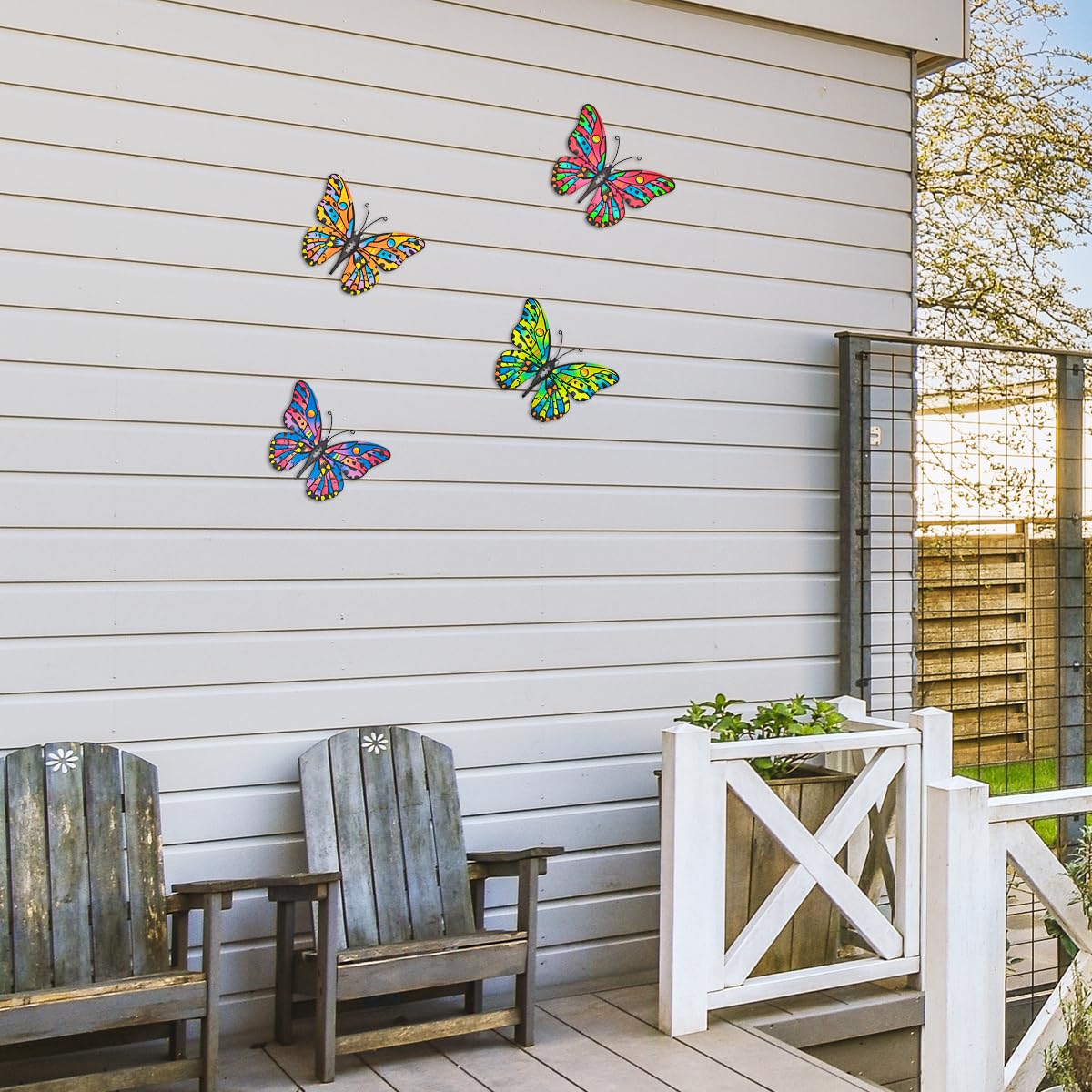 Daogtc butterfly wall art hanging on fence adds instant curb appeal.