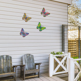 Daogtc butterfly wall art hanging on fence adds instant curb appeal.