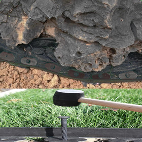 Close-up of PE terrace board flexibility, enabling creative curves in DasTior edging.