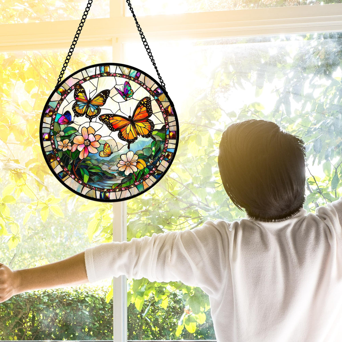 DASTOLL butterflies in the sky suncatcher brightens any room.