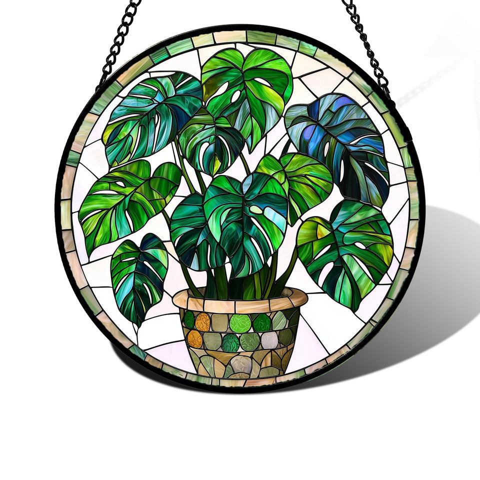 DASTOLL green monstera stained glass suncatcher catching sunlight with vibrant color