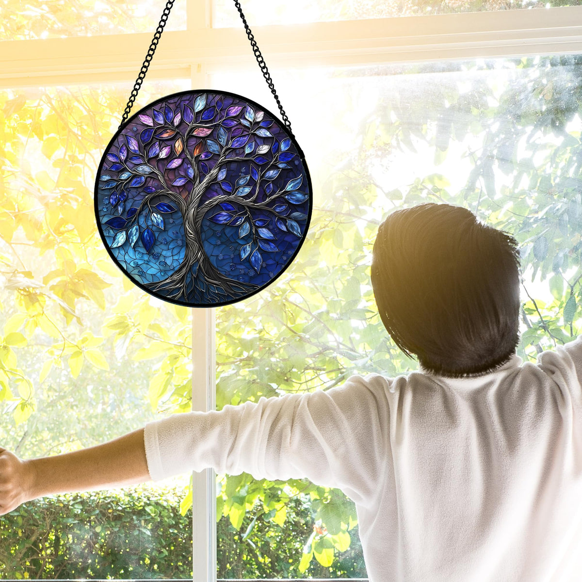 DASTOLL tree-of-life sun catcher in blue purple colors catches sunlight