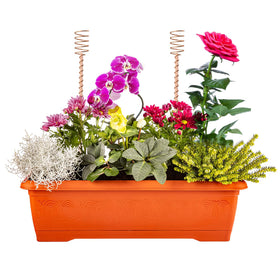 Dayimado copper stake ensemble supporting a thriving garden