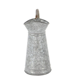 Deco 79 tall watering can features a slender handle for easy handling and display.