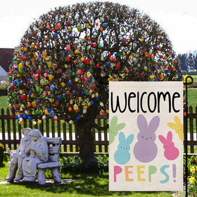 Decorhua Welcome Easter Garden Flag displayed in a garden to add seasonal charm