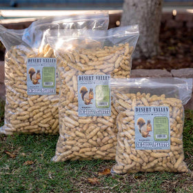 Backyard feeding station with Desert Valley Supply peanuts and visiting wildlife