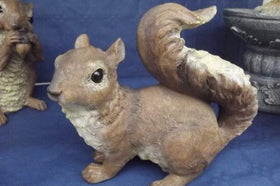 Design Toscano Chomper statue, painting detail close-up adds woodland charm.