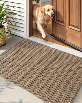 DEXI jute door mat natural fibers add rustic charm while absorbing moisture.