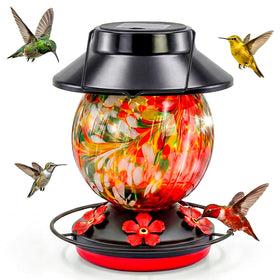 Dialan's solar hummingbird feeder with hand-blown glass reservoir and color glow