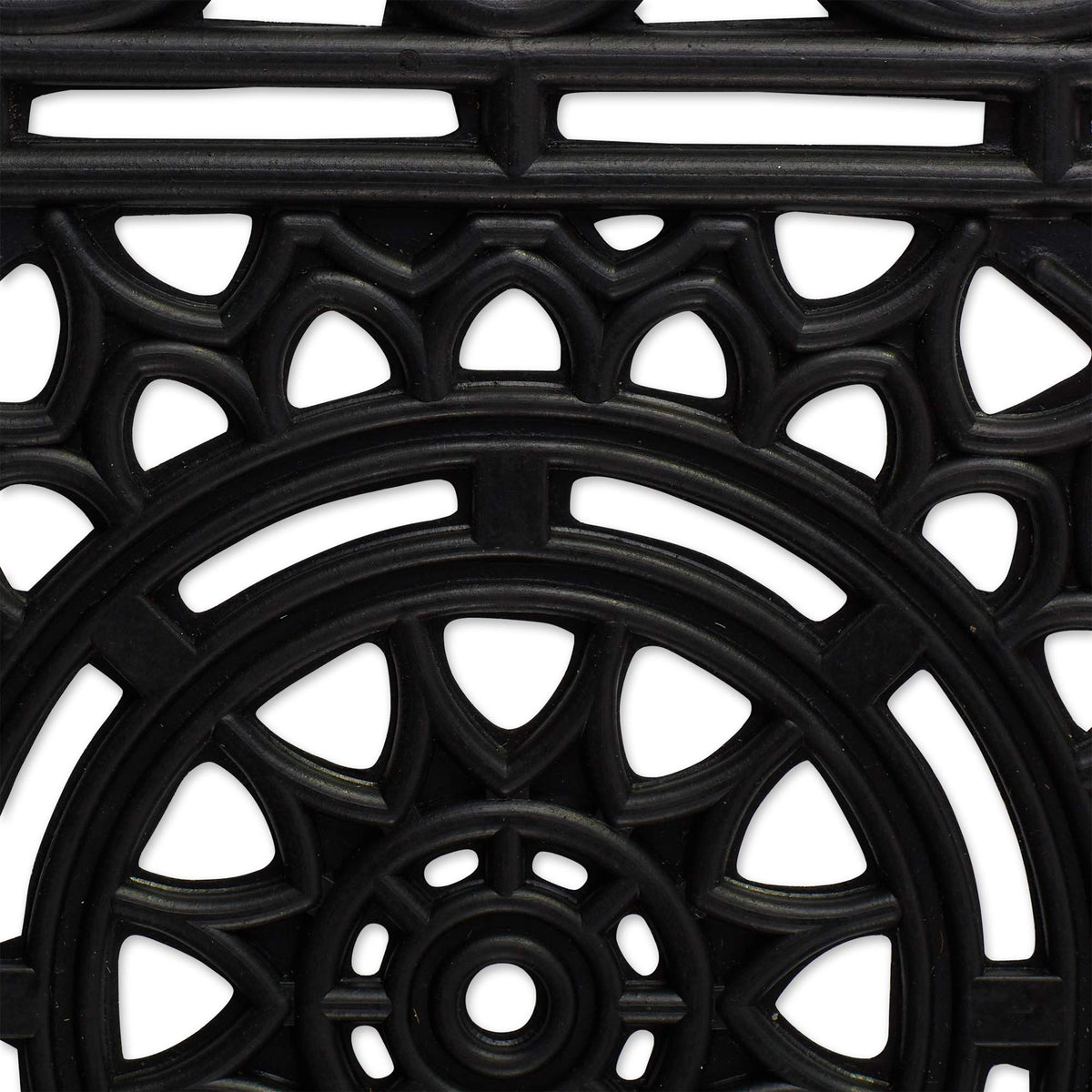 DII Sun Scroll doormat on back porch traps dirt and handles water drainage.