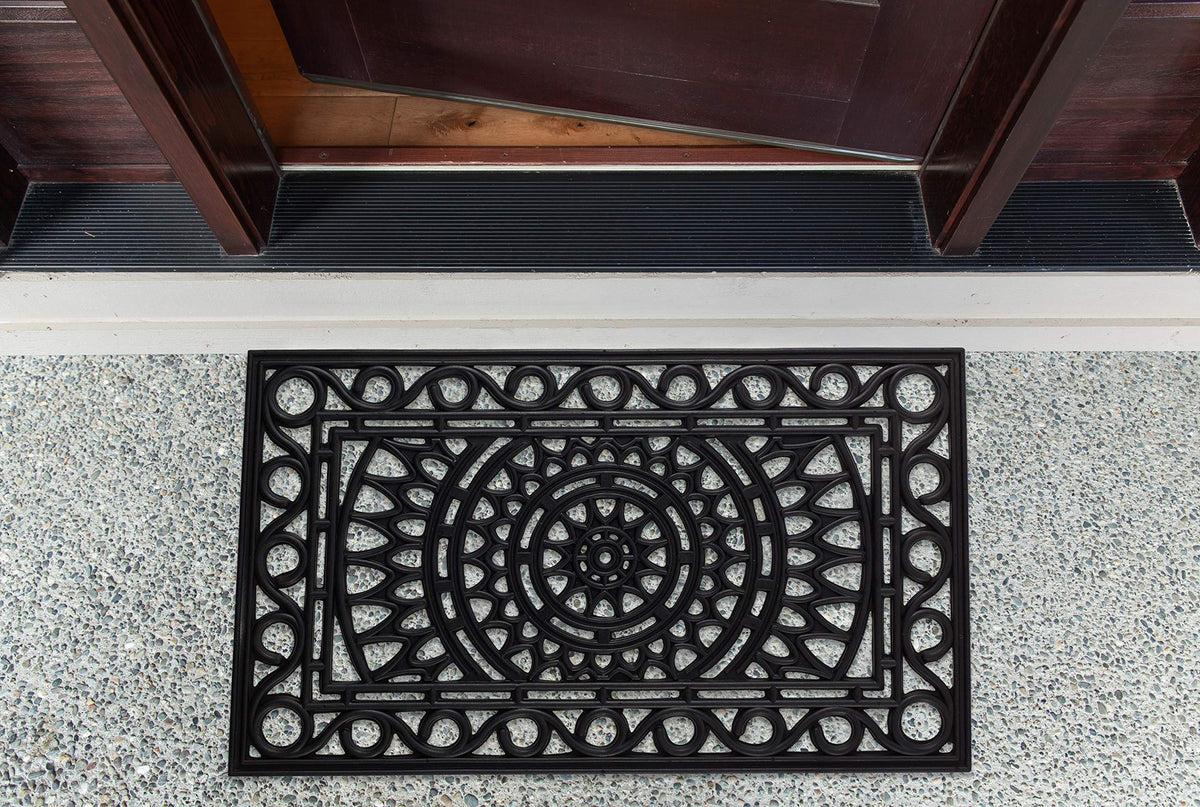DII Sun Scroll entryway doormat blends style with practical dirt protection.