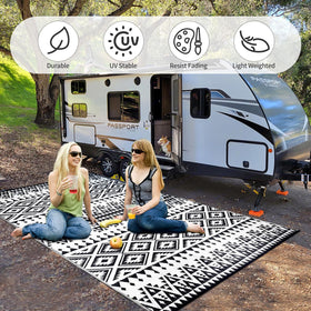 DiiKoo portable rug folds compactly and fits in its carry bag.