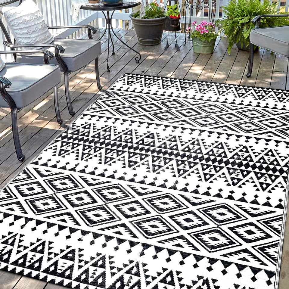 DiiKoo waterproof outdoor rug 5x8ft on patio with reversible bohemia pattern for versatile decor