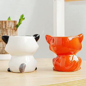 DIYOMR cow ceramic planter close-up highlights durable glaze and quirky decor.