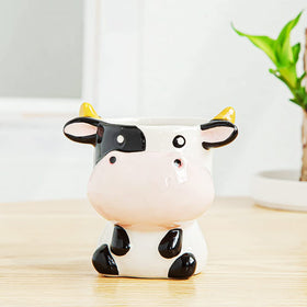 DIYOMR cow succulent pot compact size fits windowsills and desks.
