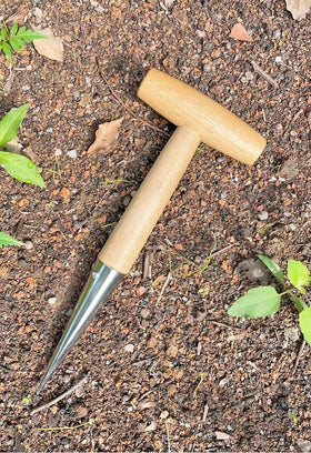 DNUZEWR garden dibbler aids transplanting seedlings with clean holes.