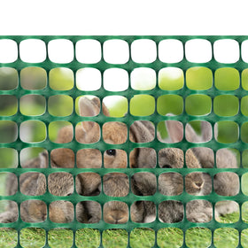 DOEWORKS pet-friendly fence deters dogs and deer from restricted areas.