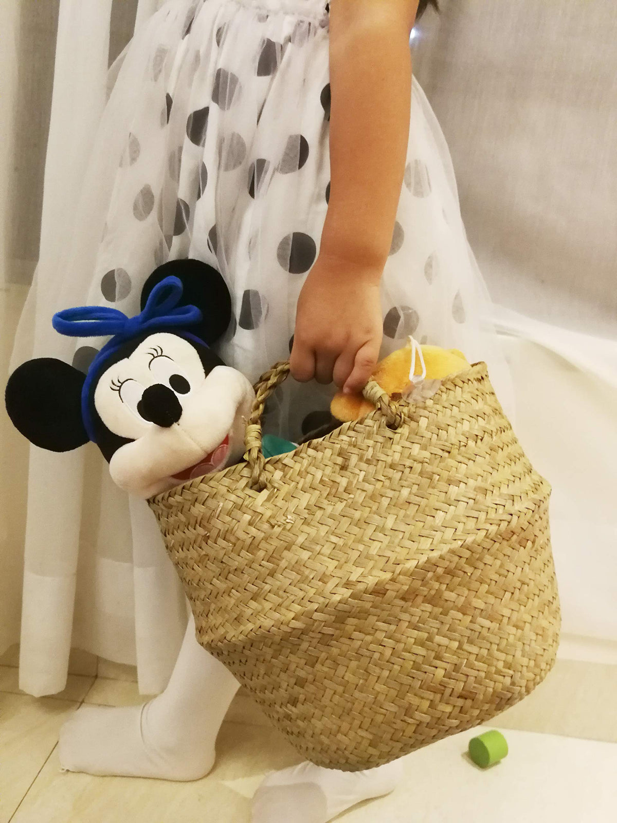 DOKOT seagrass basket in a corner complements table decor.