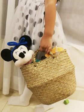 DOKOT seagrass basket in a corner complements table decor.