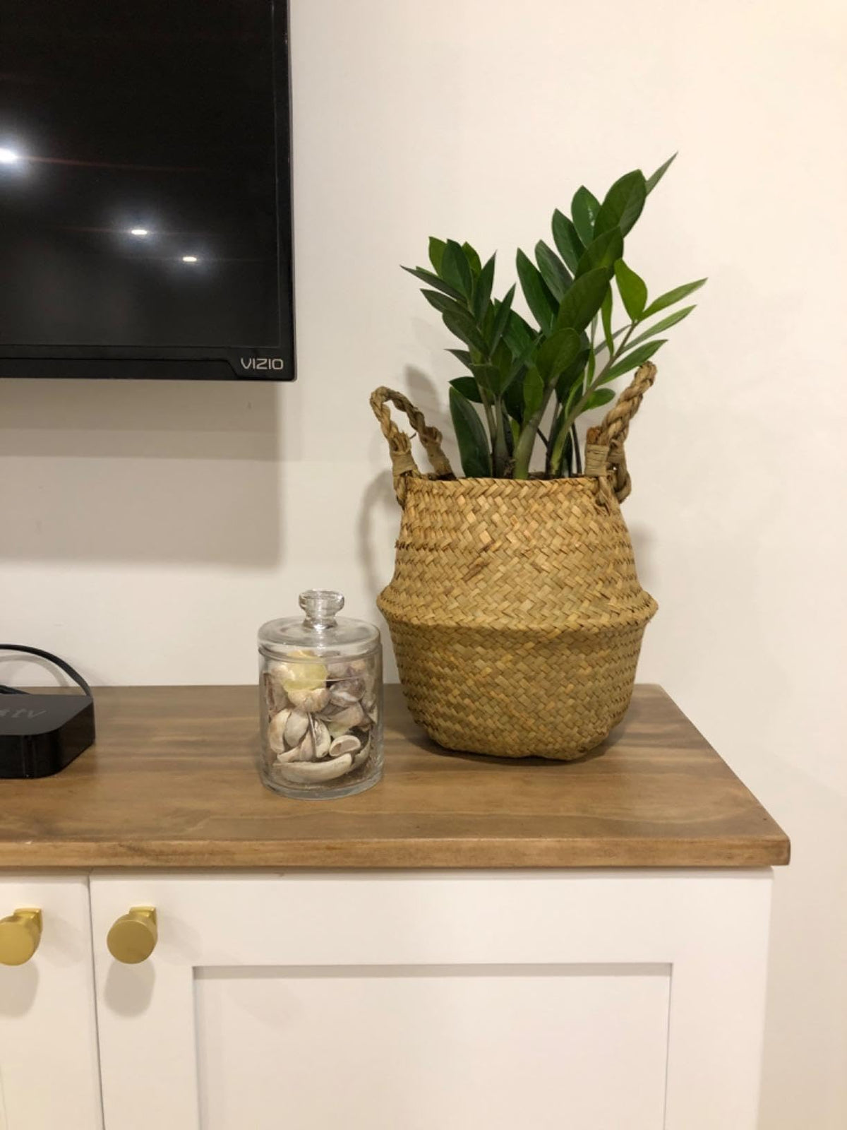 DOKOT seagrass basket serving as a decorative plant pot.