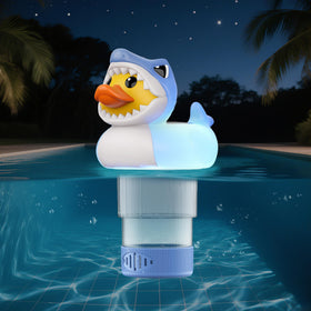 Doli Yearning duck-shark chlorine floater on a sparkling pool, decorative and functional.