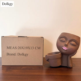 Dolkgy resin head vase decorates indoor and outdoor plant displays