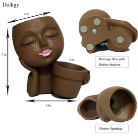 Dolkgy face pot on window, desk, or shelf adds whimsy