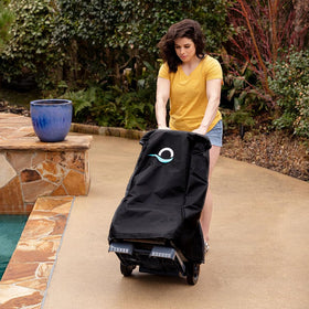 Dolphin Classic Caddy Cover handle demonstrates easy on/off for seasonal storage.